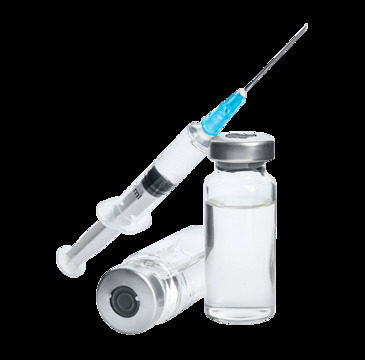 Simbolična fotografija: Oseba drži injekcijo